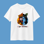 A white short-sleeve crewneck t-shirt featuring a split-color graphic of Lord Krishna, with one half in blue and the other in orange, accompanied by Devanagari text below, displayed against a solid blue background.